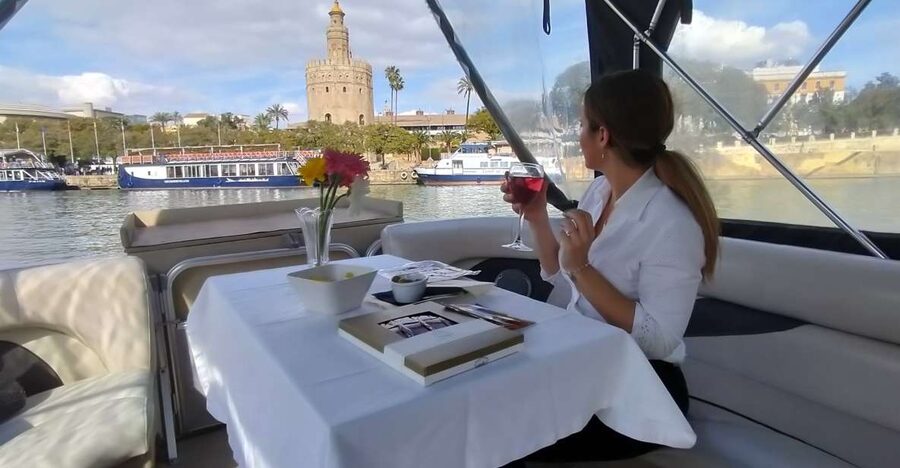 Seville: Exclusive River Boat Tour with Tapas - A compact boat instead of a crowded cruise ship