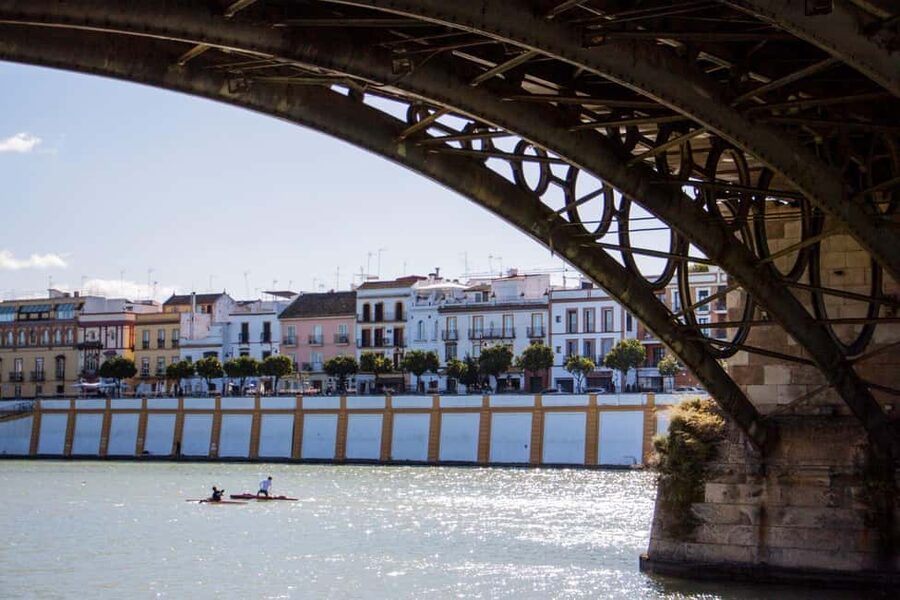 Seville: Food Tour with 10 Tastings of Tapas, Ham, Churros - Stories among Gothic and baroque Seville
