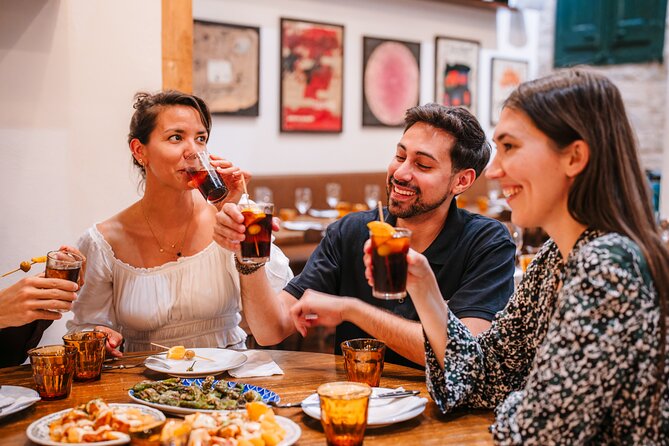 Seville Private Tapas & Wine Experience with Flamenco Show - First tastes through Casco Antiguo