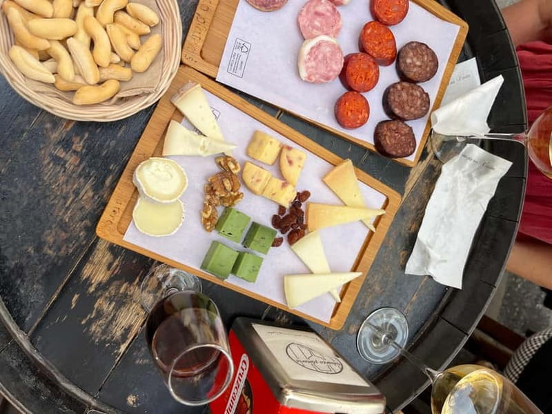 Seville: Secret Food Tour with Tapas and Drinks - Moving from market stalls to Triana tapas