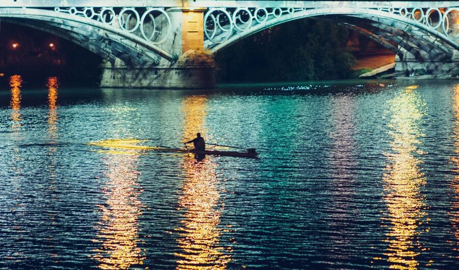 Seville: Tapas Tour Across the River in Triana - Crossing the Puente de Isabel II into old Triana