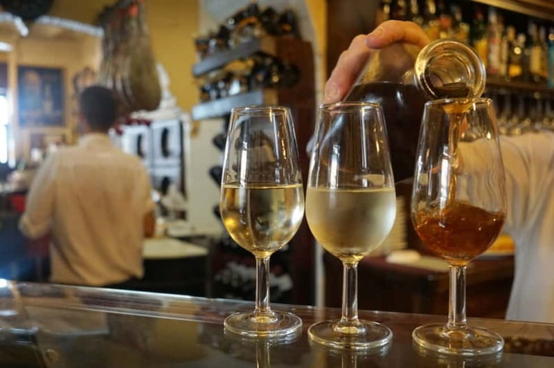Seville: Tapas Walking Tour with Traditional Flamenco Show - Key points at a glance