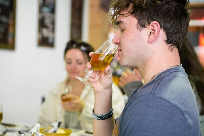 Seville: Triana Market Tapas Tour - Booking Advice and Cancellation Details