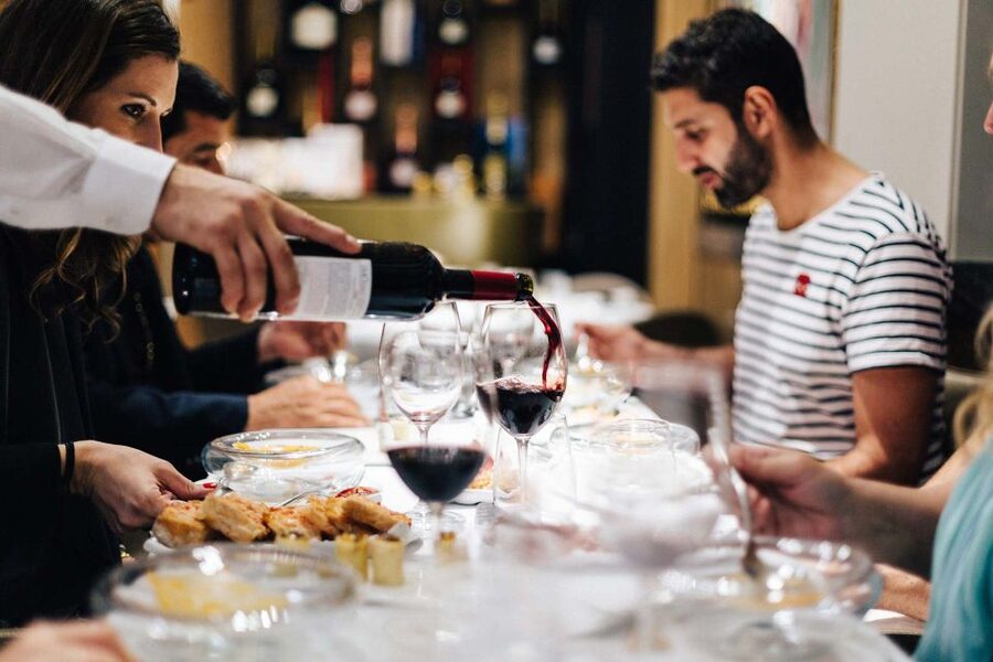 Seville: Wine and Gourmet Tapas Tour - First stop: traditional food in a local bodega