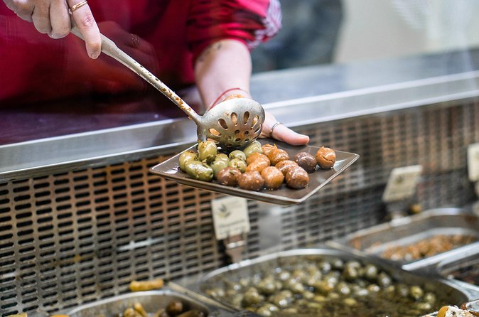 Sizzle and Savor Seville's Tapas Expedition - Food, conversation, and Andalusian culture