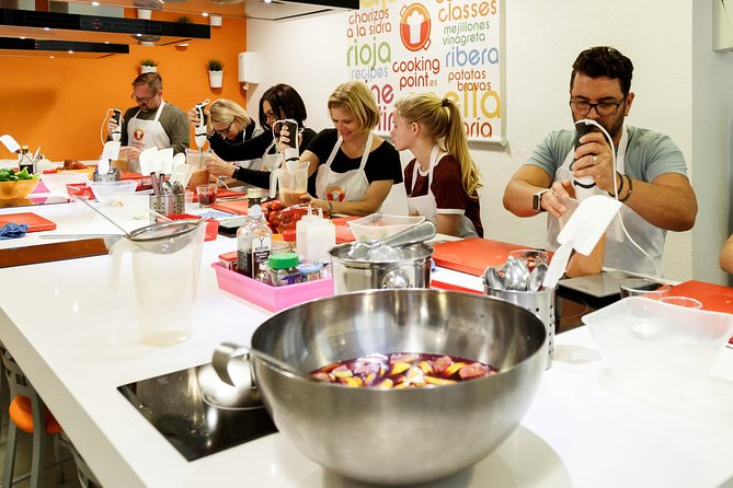 Spanish Cooking Class Paella Tapas and Sangria in Madrid - Family, Solo, and Couple Appeal