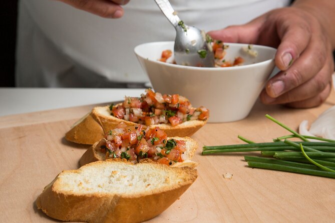 Spanish Tapas Cooking Class + Unlimited Wine (6-Course Meal) - Ibérico pork with potatoes and Canadian mojo sauce