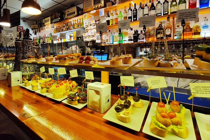 Spanish Wine and Tapas Tour in a Local Neighborhood in Barcelona - How the evening unfolds at the stops