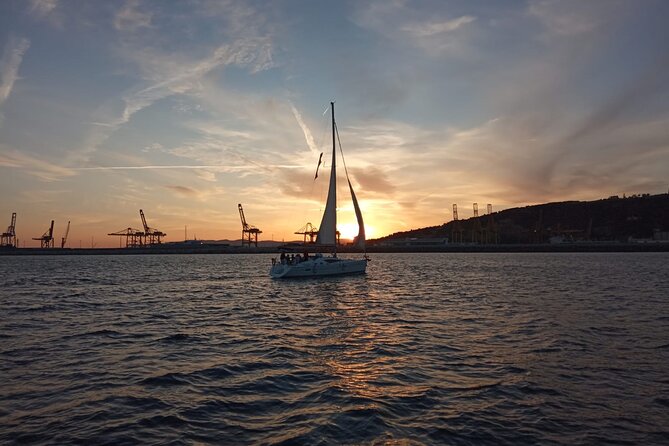 Sunset Sailing Experience w/ Live Spanish Guitar & Spanish Tapas - The Barcelona skyline from the Mediterranean