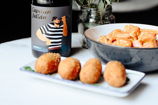 Tapas & Paella Experience | 3 Local places | Meet Travelers - Stop one: three tapas at a Valencian restaurant