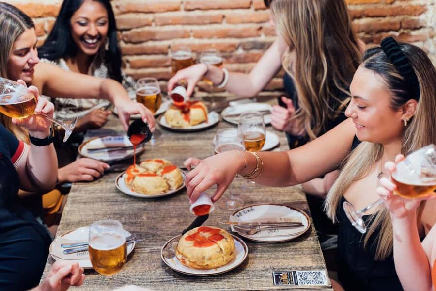 Tapas, Wine & Culture: Madrid Private Food Tour Experience - La Latina: the neighborhood heart of the walk