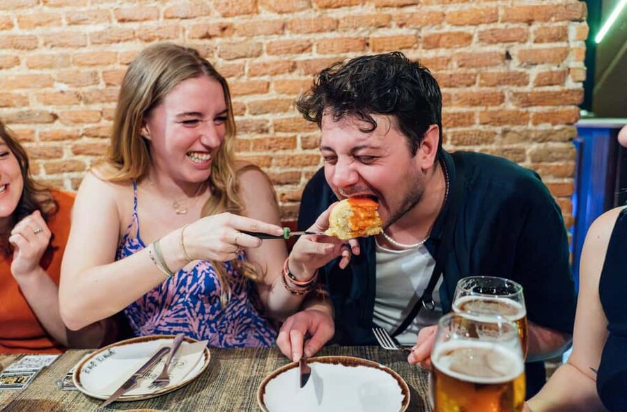 Tapas, Wine & Culture: Madrid Private Food Tour Experience - Sol: Madrid in a busy central setting