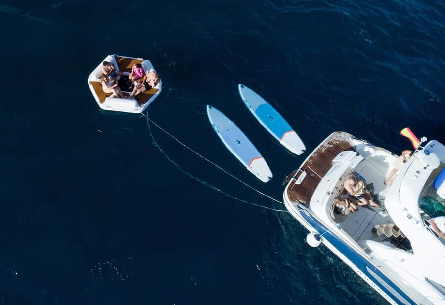 Tenerife: Shared Yacht Cruise with Champagne and Tapas - La Caleta for swimming, snorkeling, and water toys