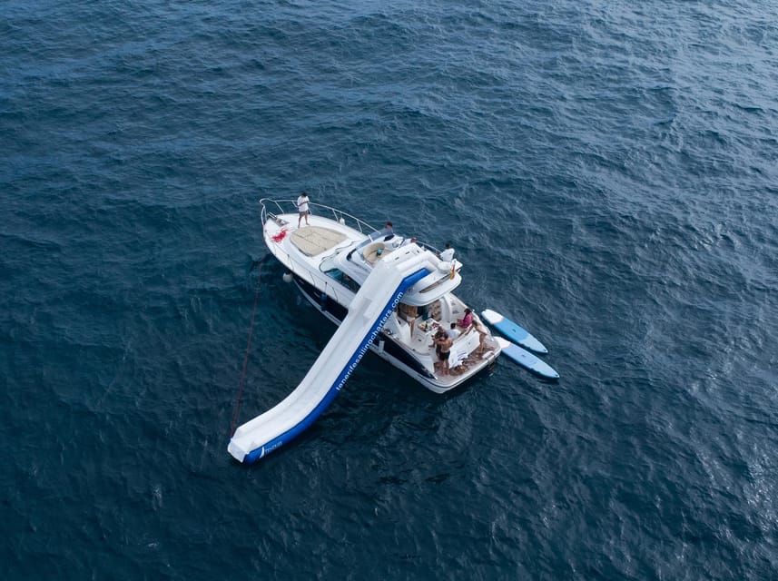 Tenerife: Shared Yacht Cruise with Champagne and Tapas - The first 45 minutes: coast views and marine life