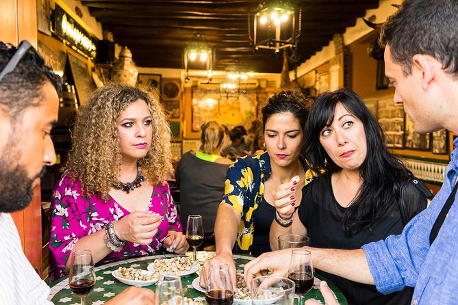 The Seville Tapas Crawl Tour by Food Lover Tour - Four bars and a proper Seville dinner