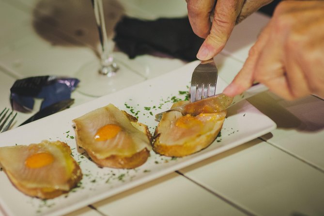 Triana Gourmet Tapas Tour in Seville - Mercado de Triana and the changing food scene