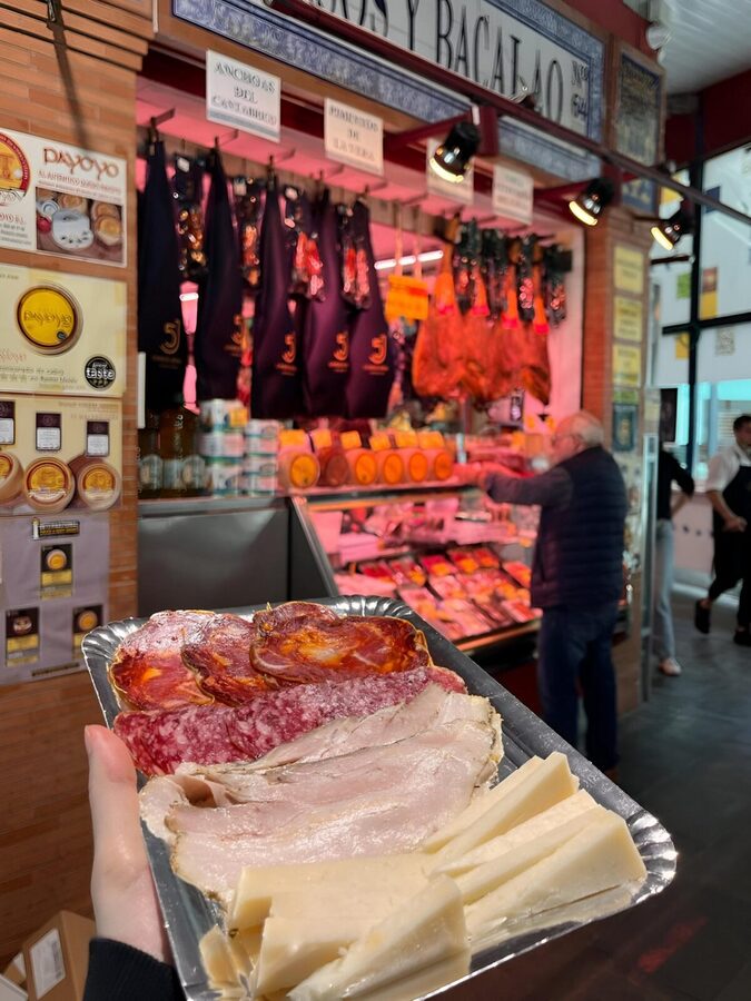 Triana Market Tapas Tour - Understanding the ham, sausages, and olives