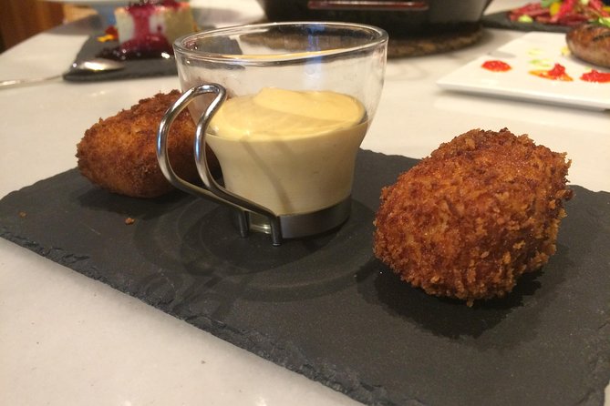 Try Madrid Best Churros, Tapas & Market by FLT - Starting at Teatro La Latina and entering old Madrid