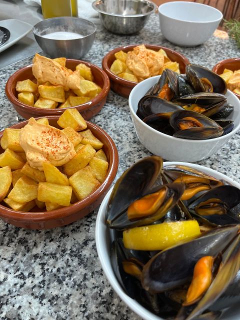 Valencia: Evening Guided Paella Workshop, Tapas, and Drinks - What $77 includes and whether it is good value