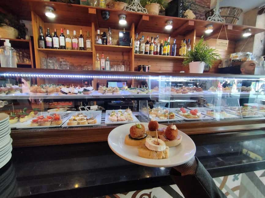 Valencia: Street Food Tour including Paella & Tapas Tasting - Key points at a glance