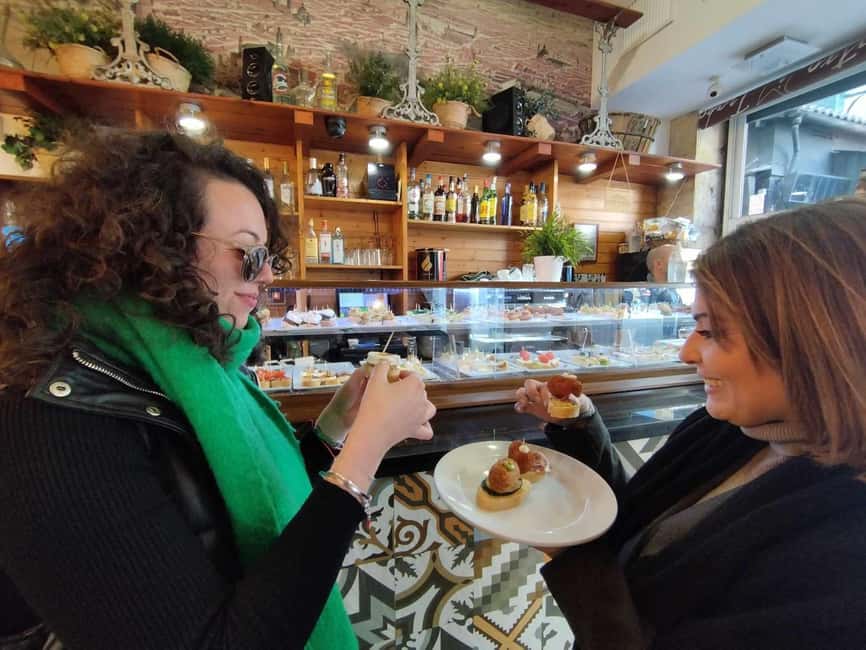 Valencia: Street Food Tour including Paella & Tapas Tasting - A savory start with tostada
