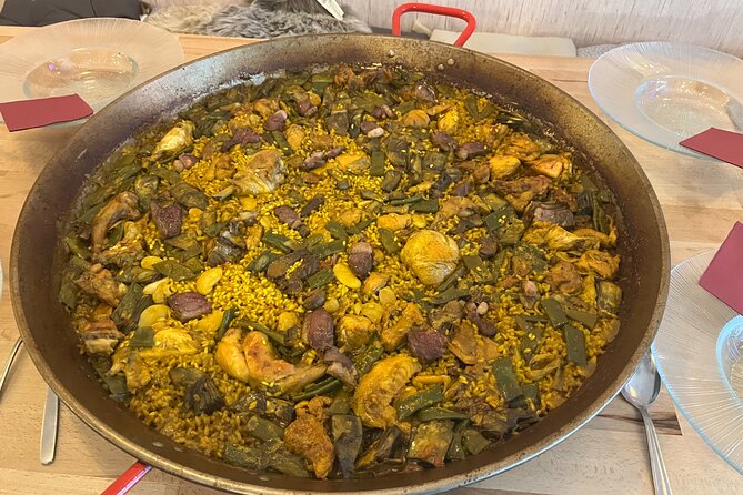 Valencian Paella class with welcome drinks and tapas - Eating the meal you helped prepare