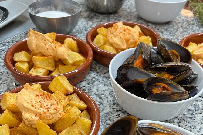 Valencian Paella Cooking Class, Tapas & Sangria - Evening - Learning the Valencian version of paella
