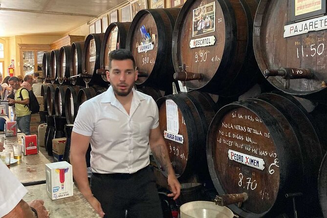 Wine and Tapas walking Tour in Malaga - Third stop: atmosphere, food, and conversation